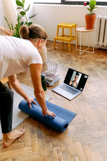Person watching online yoga class